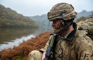 Soldier waiting to cross river